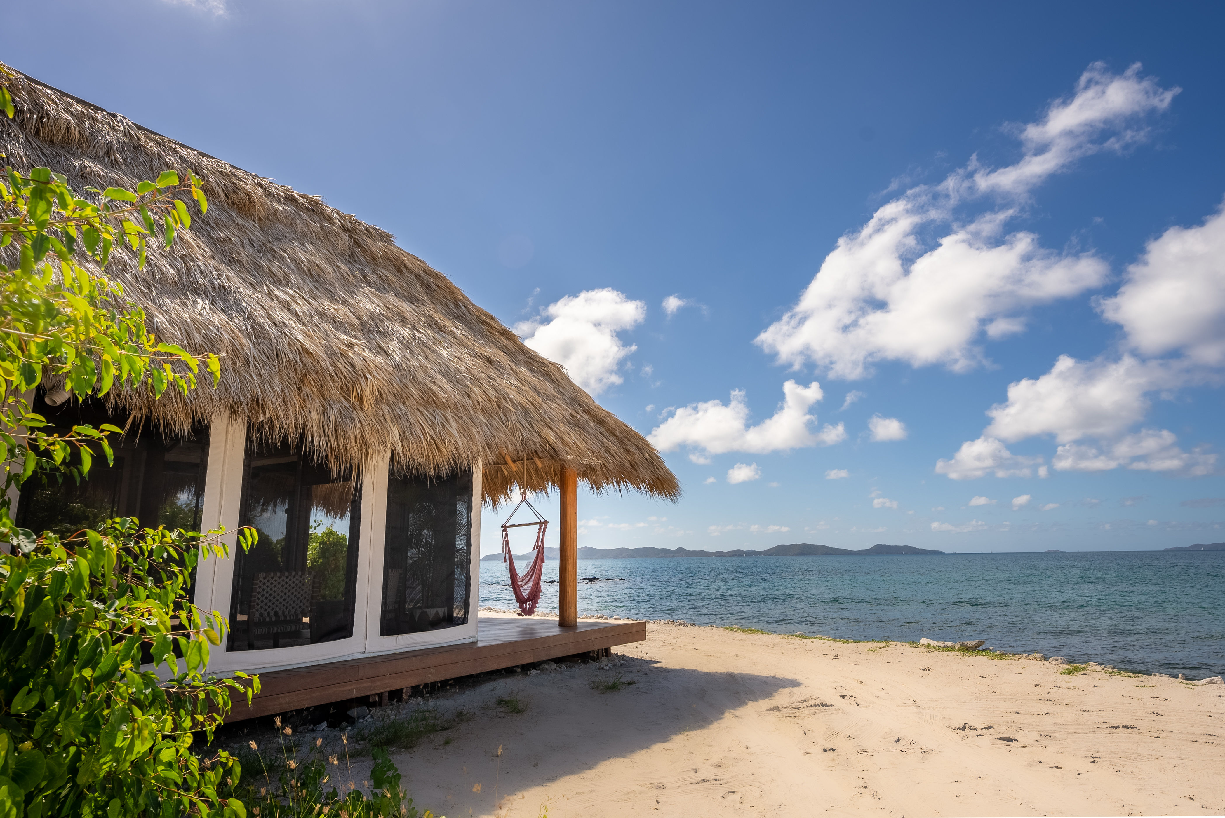image This charming beach teepee is just steps from the sand and sea.