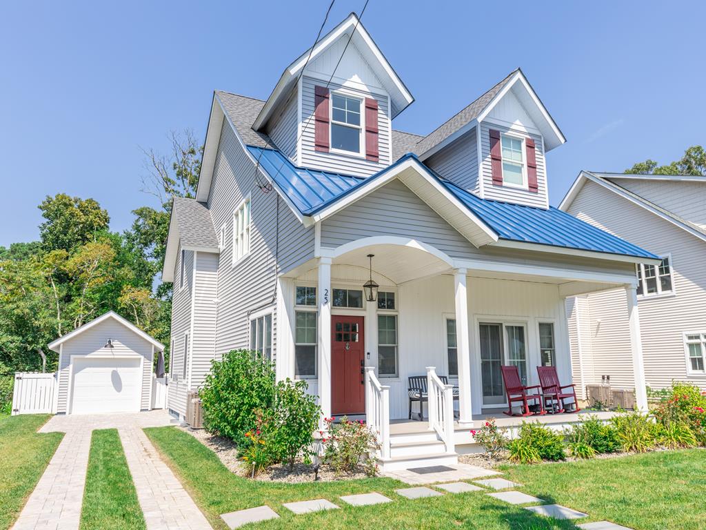 image Charming beach-block home with inviting curb appeal, just steps from the tranquil Delaware Bay.