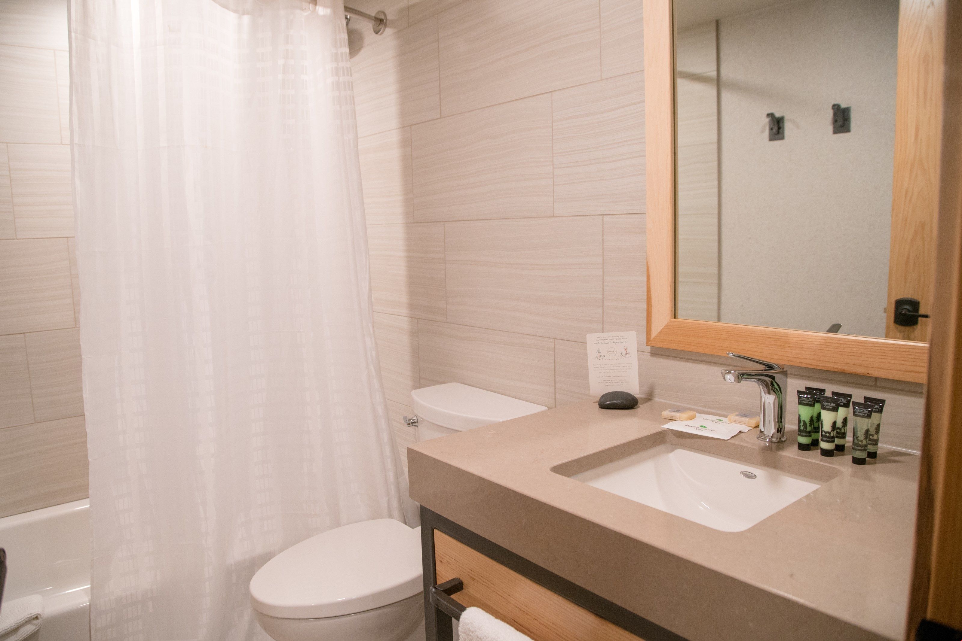 image Get ready for the day ahead in the full and bright bathroom.