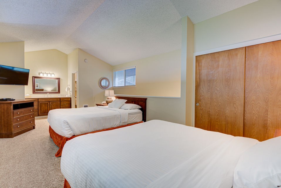 image This spacious Panoramic Ocean View Loft features two comfortable queen beds and a cozy layout, perfect for relaxing after a day by the beach.