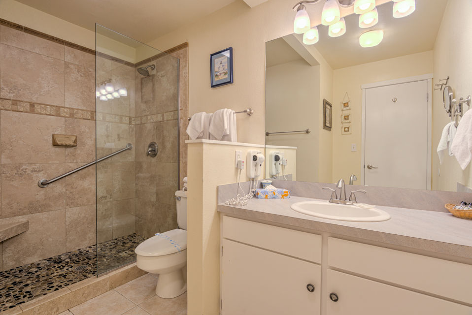 image The stylish bathroom features contemporary fixtures, ensuring a comfortable experience for guests.