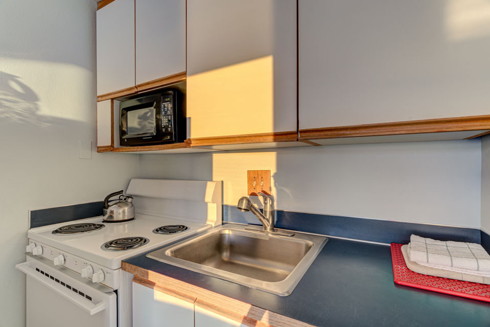 image The kitchenette is equipped with essential appliances for easy meal preparation during your stay.