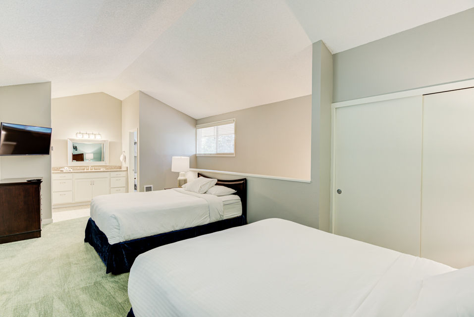 image The cozy Forest View 2 Queen Bedroom Loft features two comfortable queen beds with ample natural light and a spacious layout.
