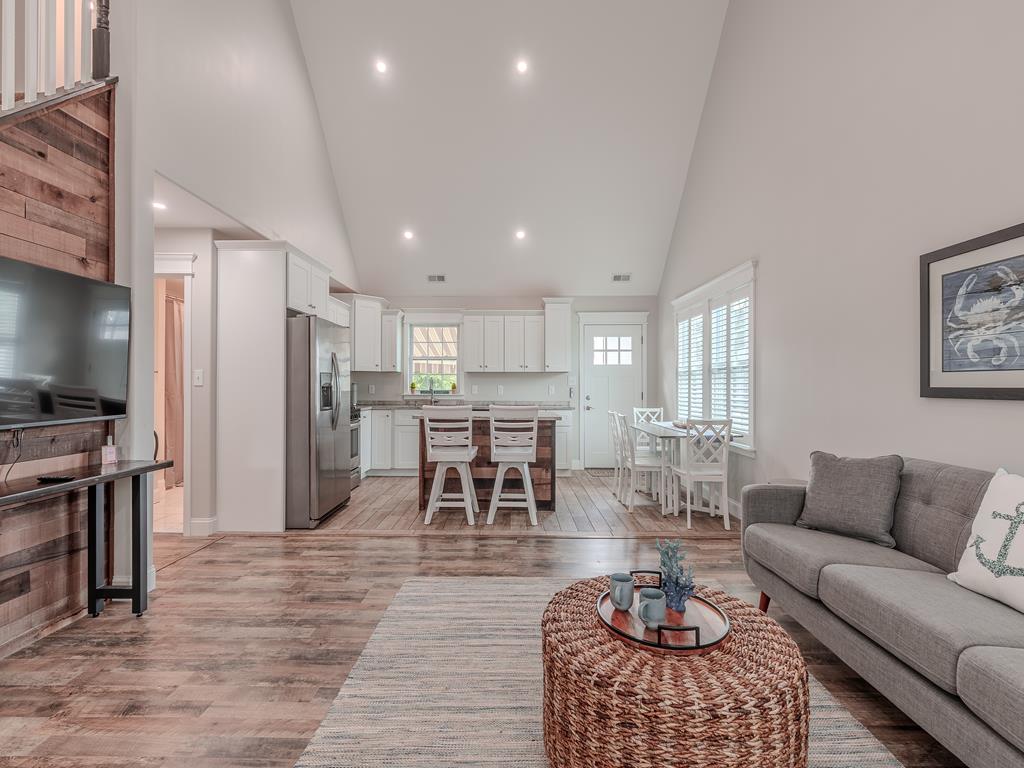 image Bright and modern open-concept space with premium appliances and a warm ambiance.