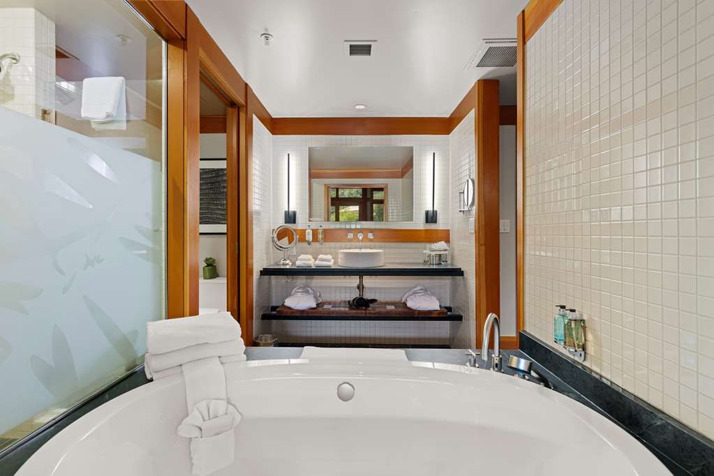 image Oversized soaking tub invites you to unwind in complete tranquility after a day of discovery.