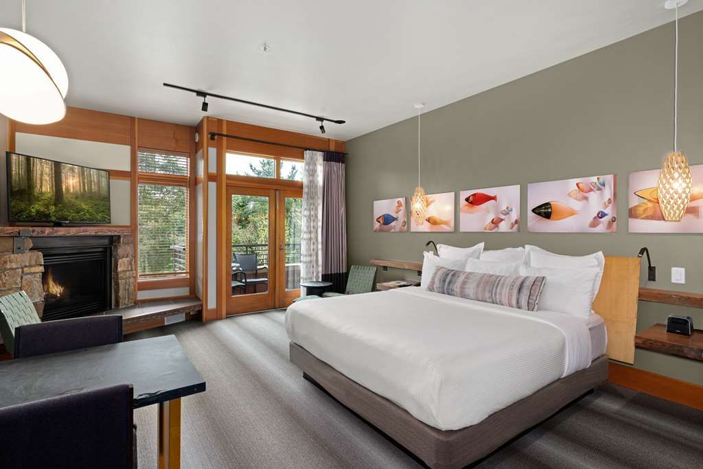 image Plush bed and open design invite restful nights surrounded by the charm of wine country.