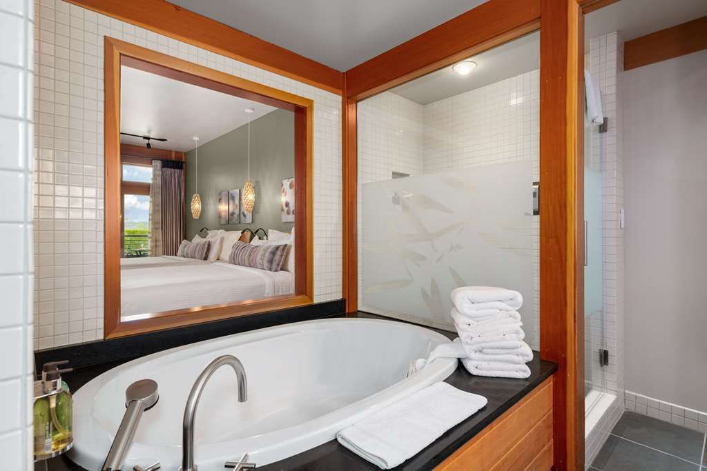 image Spa-style soaking tub invites restorative moments in the privacy of your retreat.