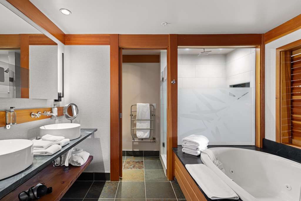 image Modern bath features blend seamlessly with rustic charm to create a refined, calming escape.