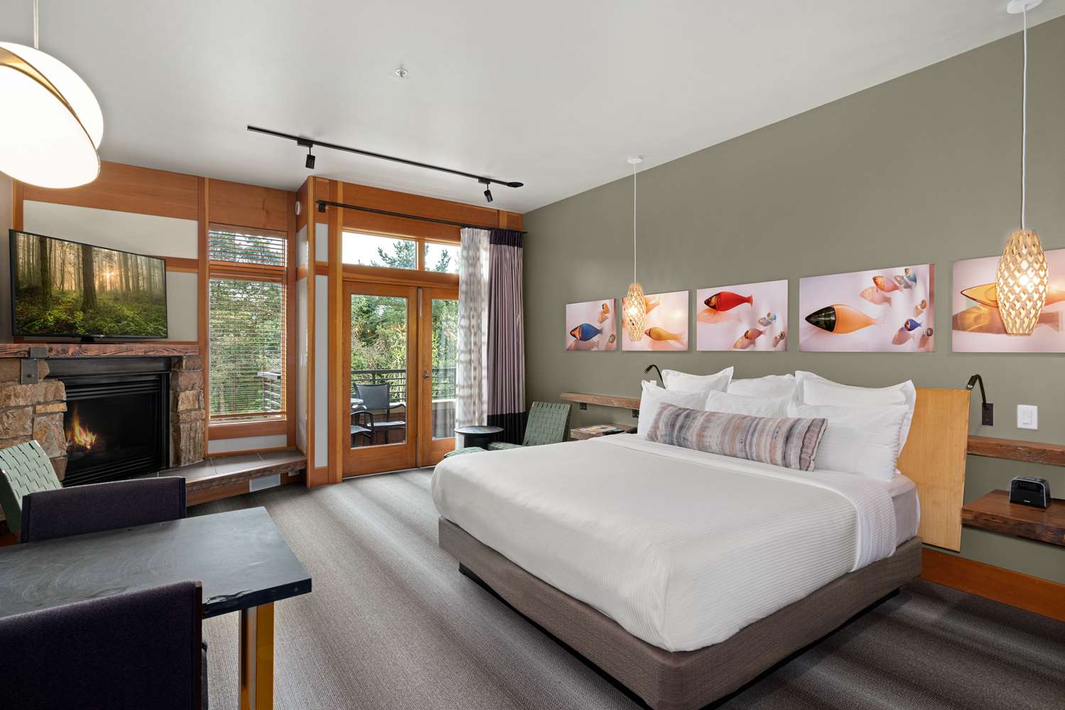 image Plush bed and open layout bring warmth and comfort to your stay.
