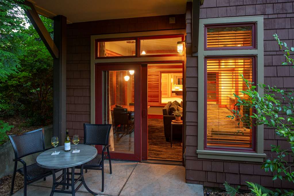 image Private patio framed by gardens offers a quiet place to sip, savor, and unwind.