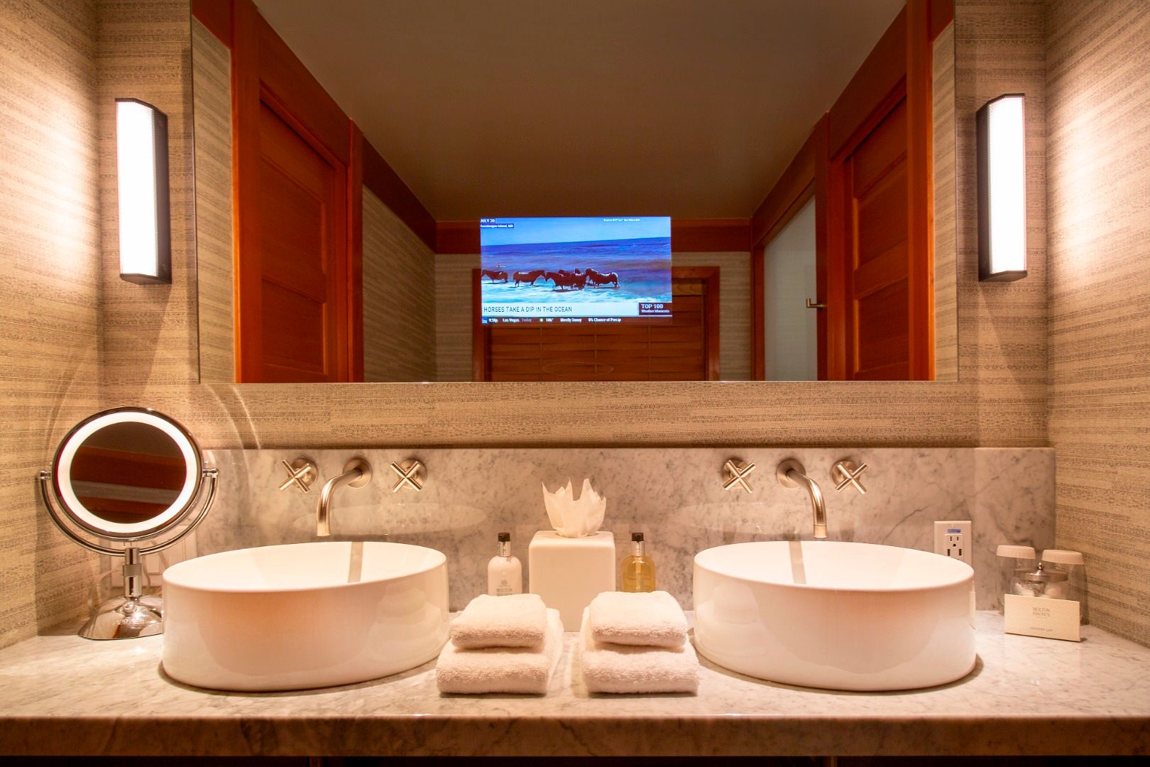 image Dual vanities and modern finishes add a touch of luxury to your daily rituals.