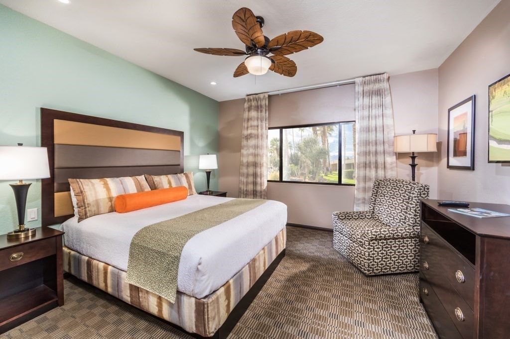 image The charming bedroom offers a serene retreat, showcasing a comfortable bed, stylish decor, and natural light streaming through the window.