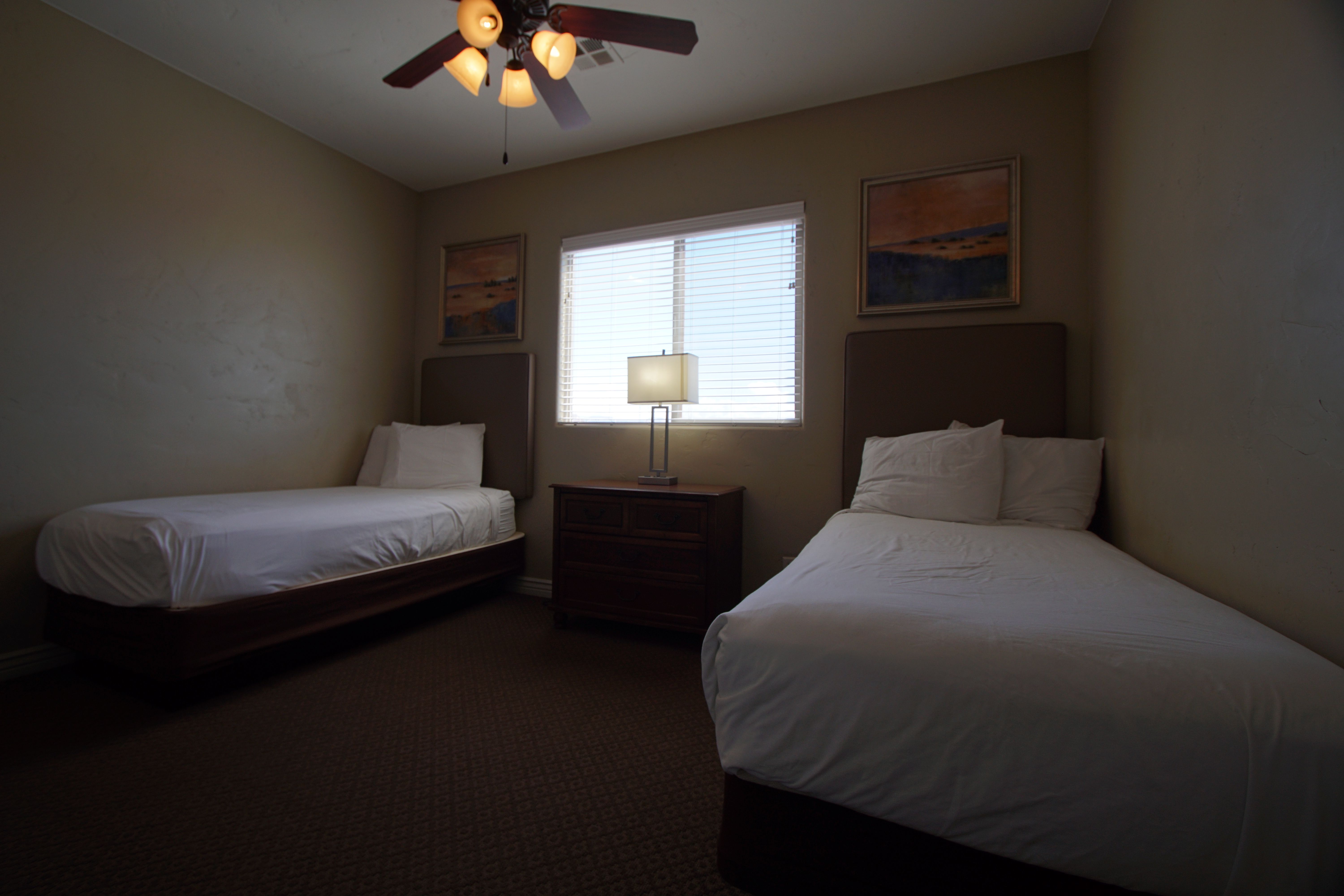 image Third bedroom with twin beds, perfect for families or additional guests.