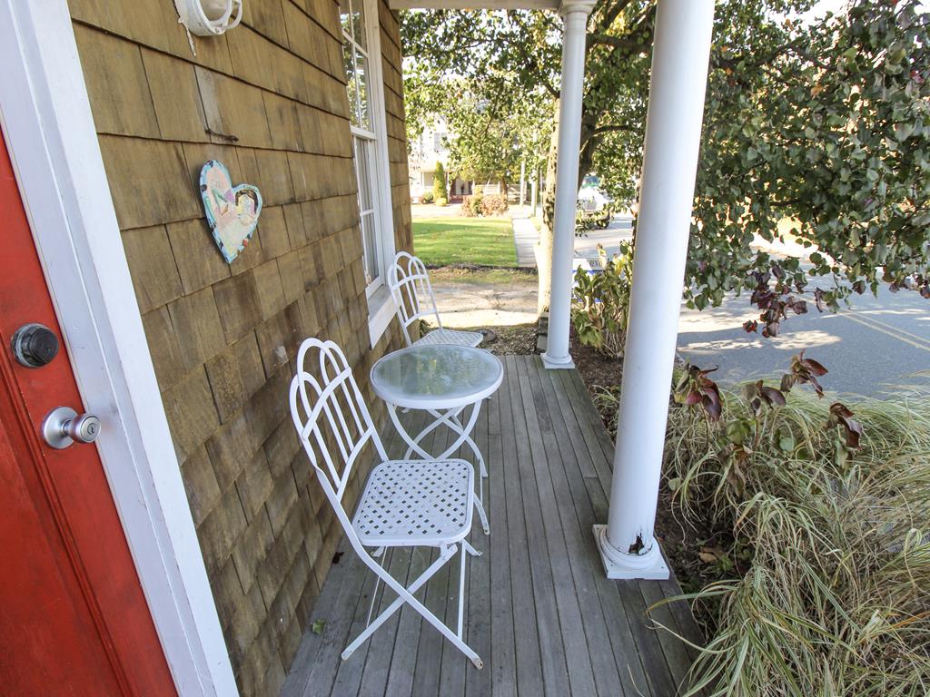 image Enjoy your morning coffee or a glass of wine on this cozy front porch bistro set.