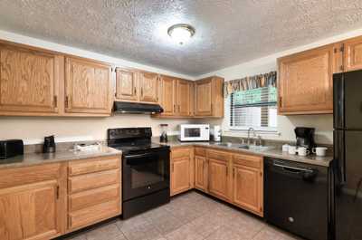 Whip up family favorites in the fully equipped kitchen with modern appliances and plenty of counter space.