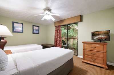 Sleep soundly in the comfy king suite with wooded views and a touch of mountain style.