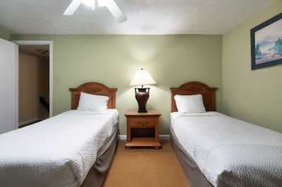 Twin beds and woodland charm make this room perfect for kids or extra guests.