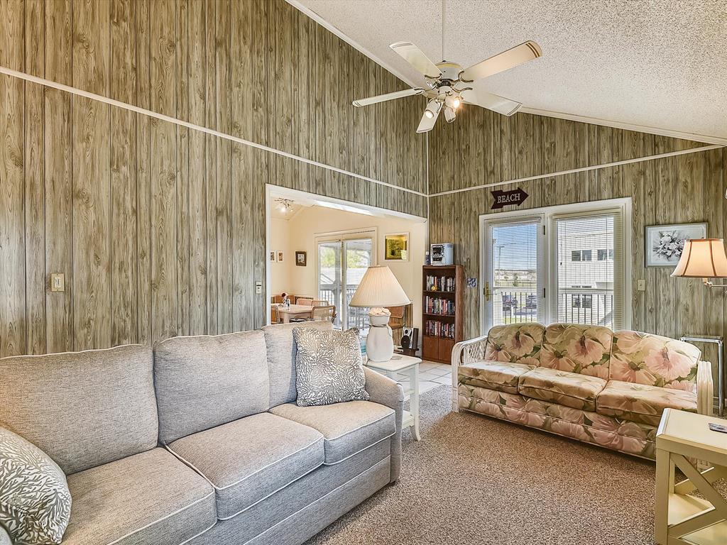 image Enjoy the airy living area, filled with natural light and comfortable seating.