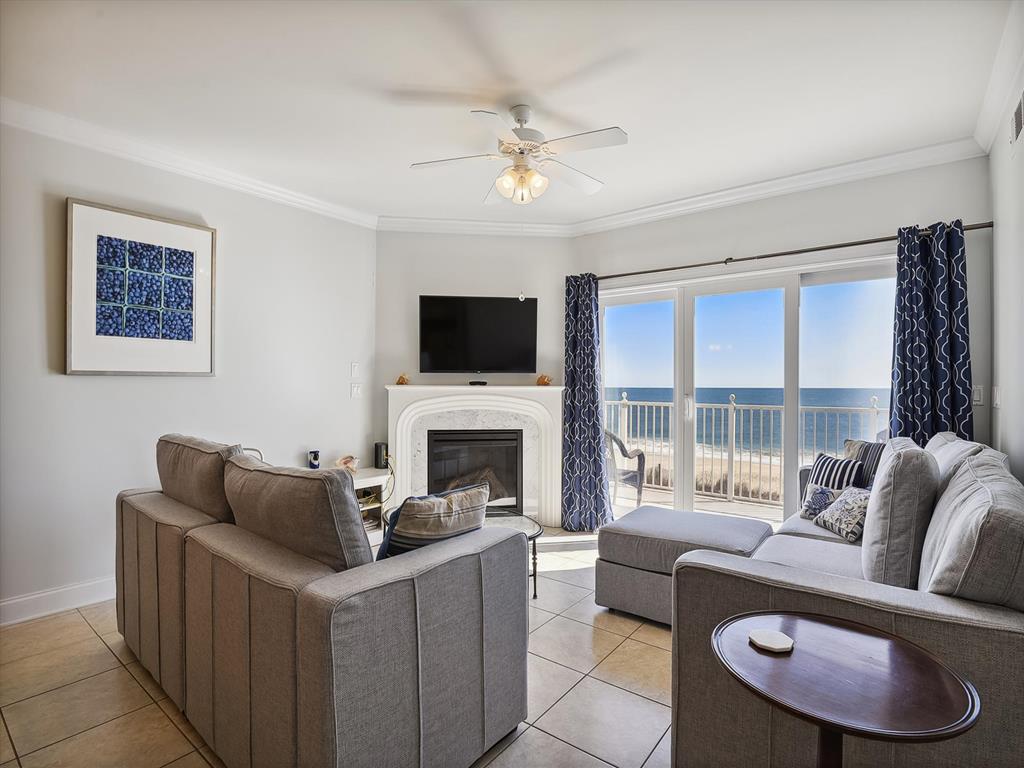 image The airy living room has large windows framing stunning ocean vistas.