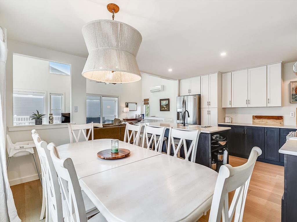 image Bright dining and kitchen space showcasing the home’s open layout and modern finishes.