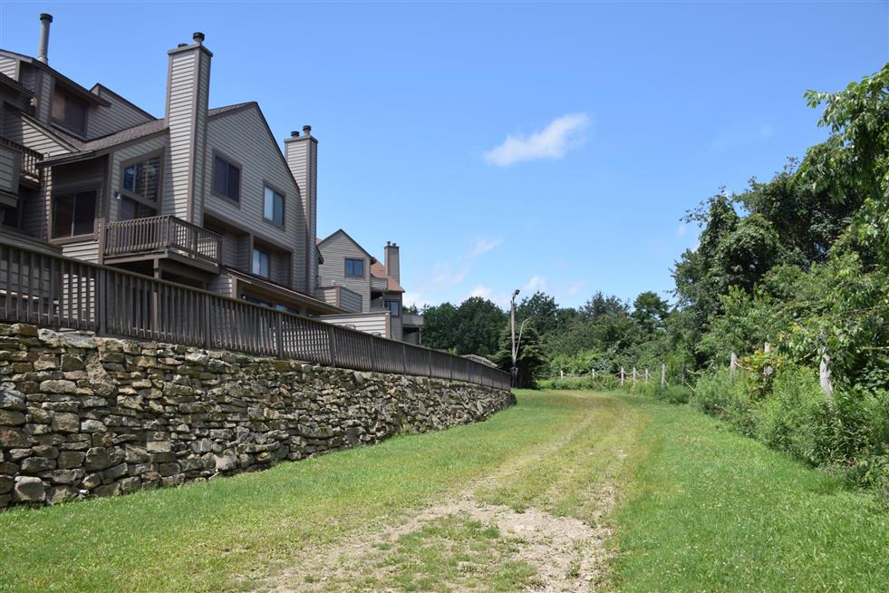 image Charming mountain pathway leading to adventure, where crisp air and scenic trails invite you to explore.
