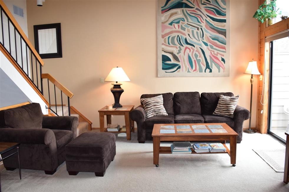 image Inviting living area filled with warm light and rustic charm, offering the perfect spot to unwind after a day on the mountain.