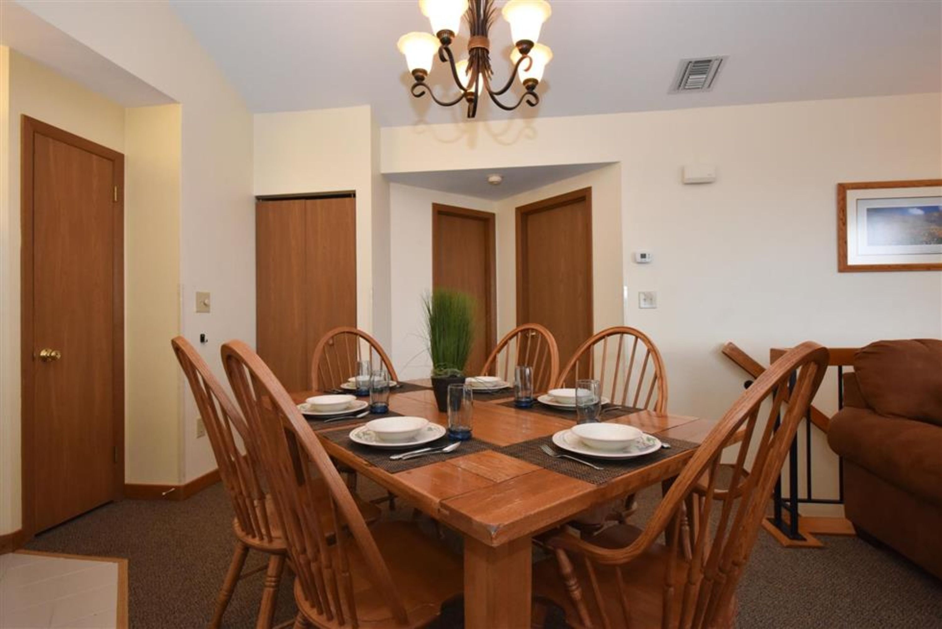 image Warm dining space with seating for six, a perfect gathering spot after a day exploring the Laurel Highlands.