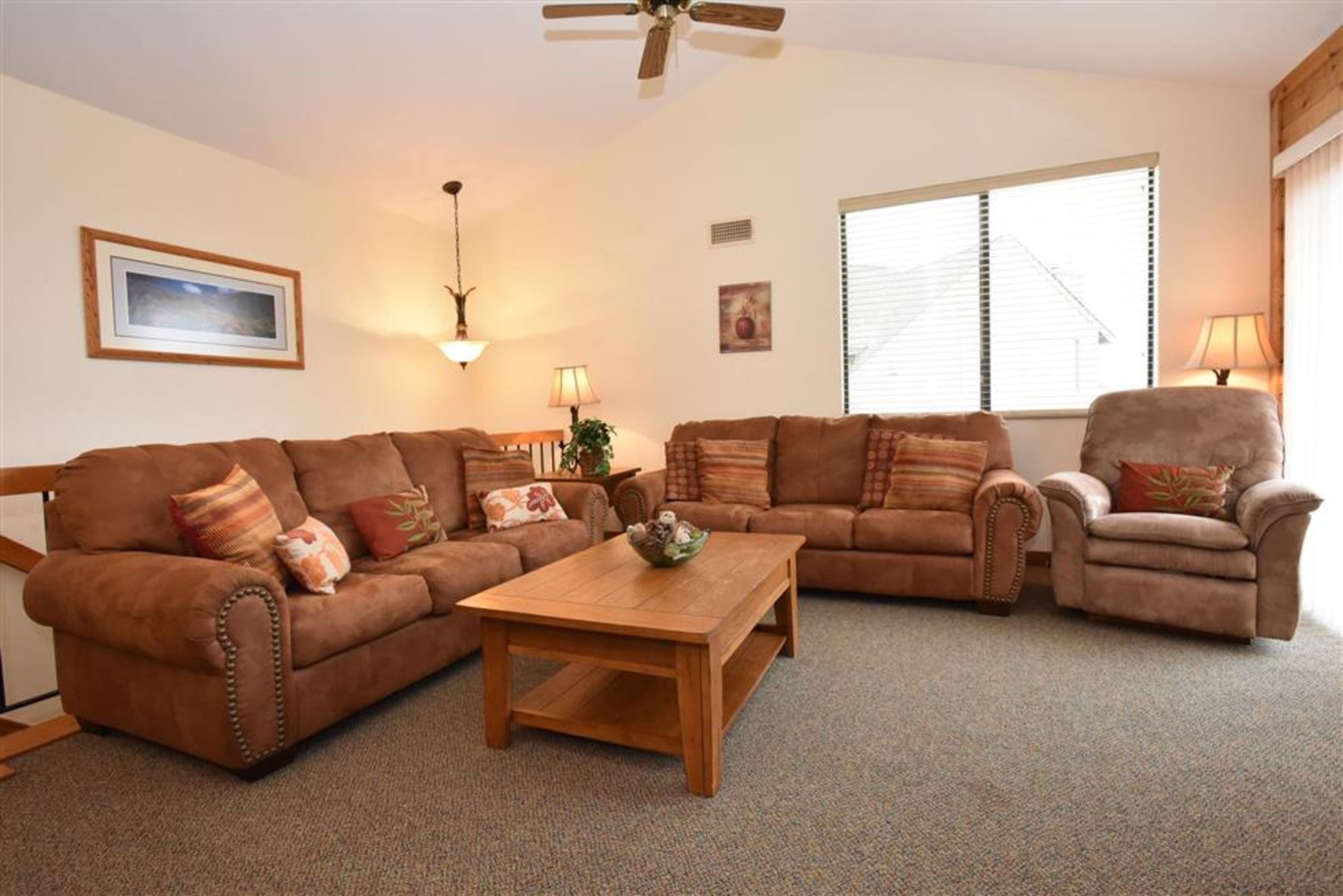 image Cozy living area with plush sectional seating, perfect for relaxing after a day on the slopes.