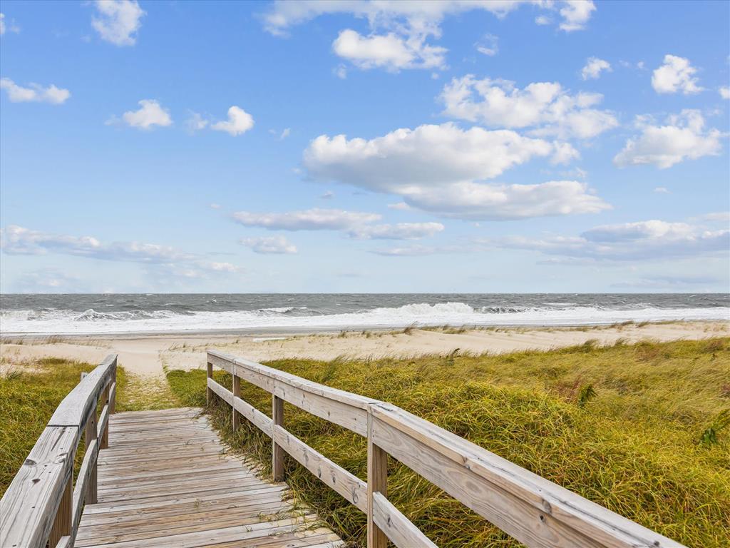 image Private boardwalk leading straight to the sandy beach and ocean.