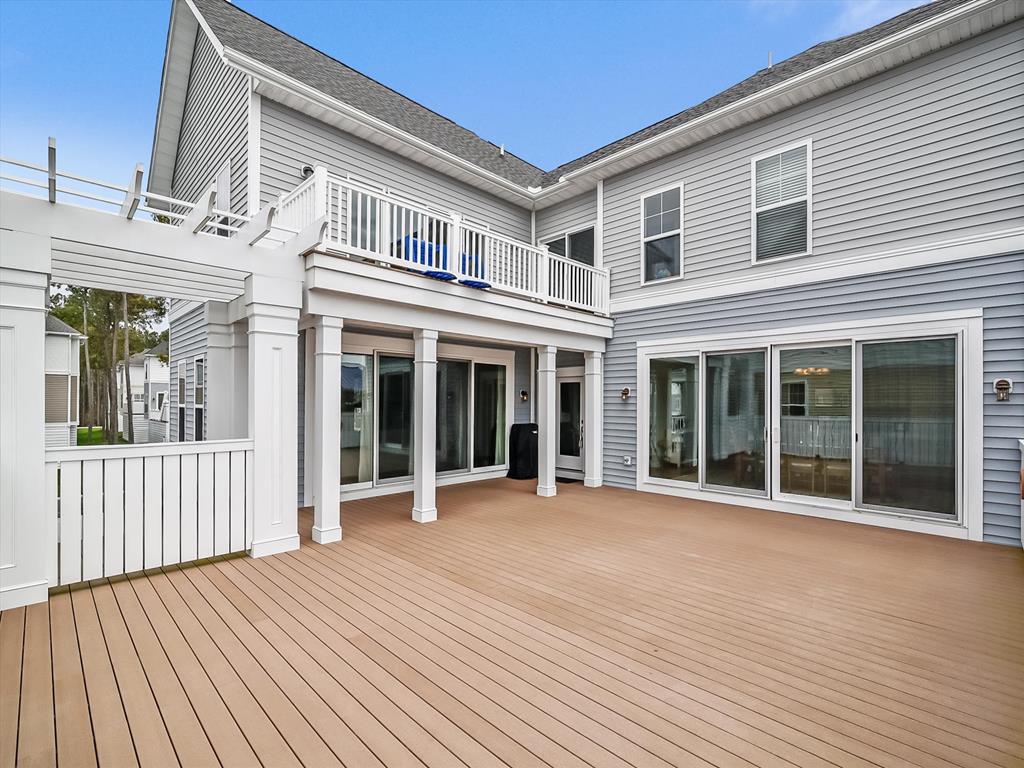 image Gather on the expansive deck, perfect for memorable evenings under the stars.