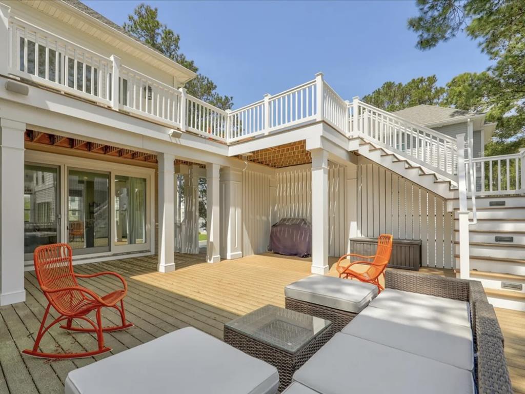 image Step onto the spacious outdoor deck, perfect for lounging and enjoying the fresh air.