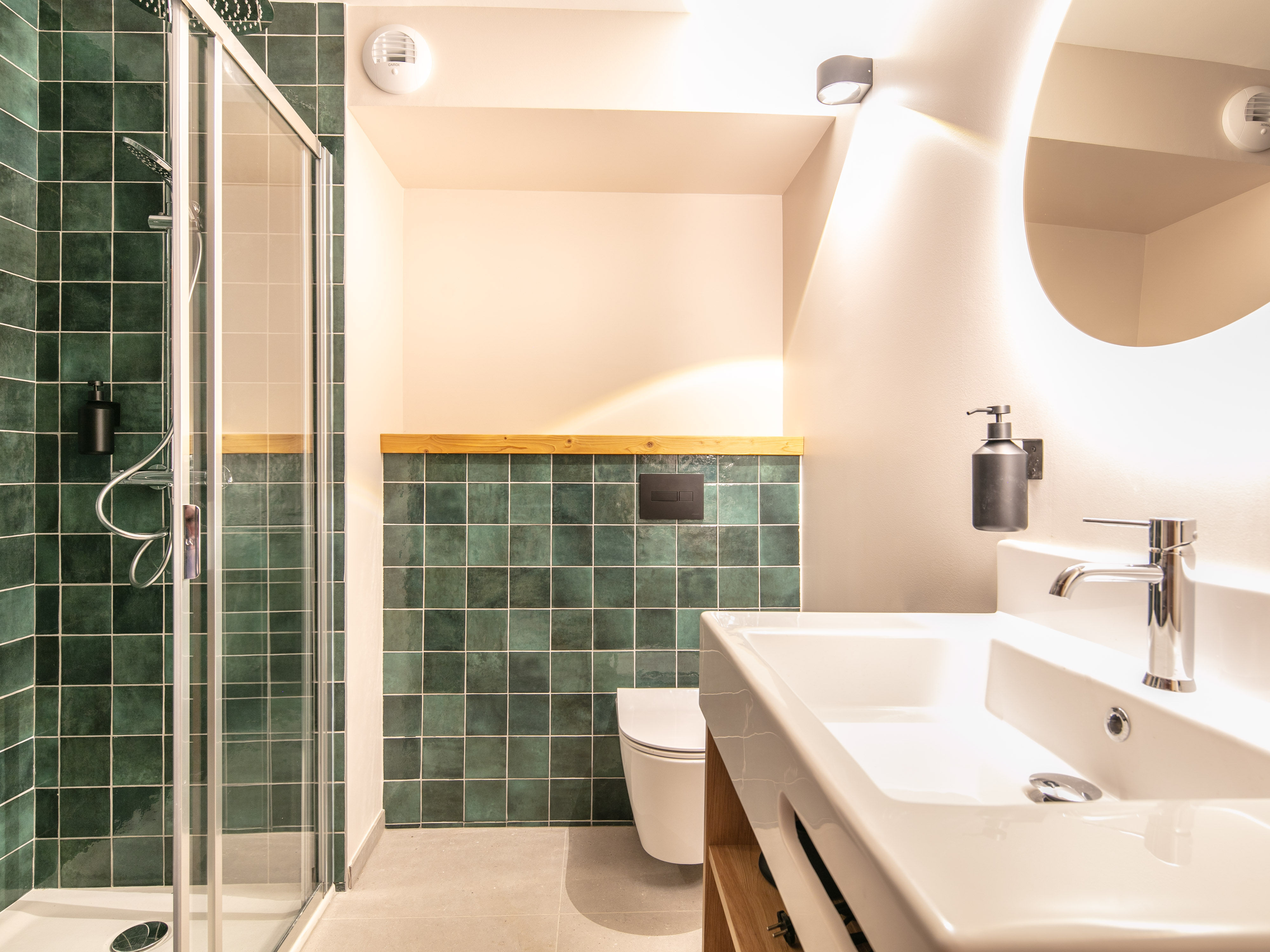 image Refresh in this contemporary bathroom, complete with modern tiles and sleek fixtures.