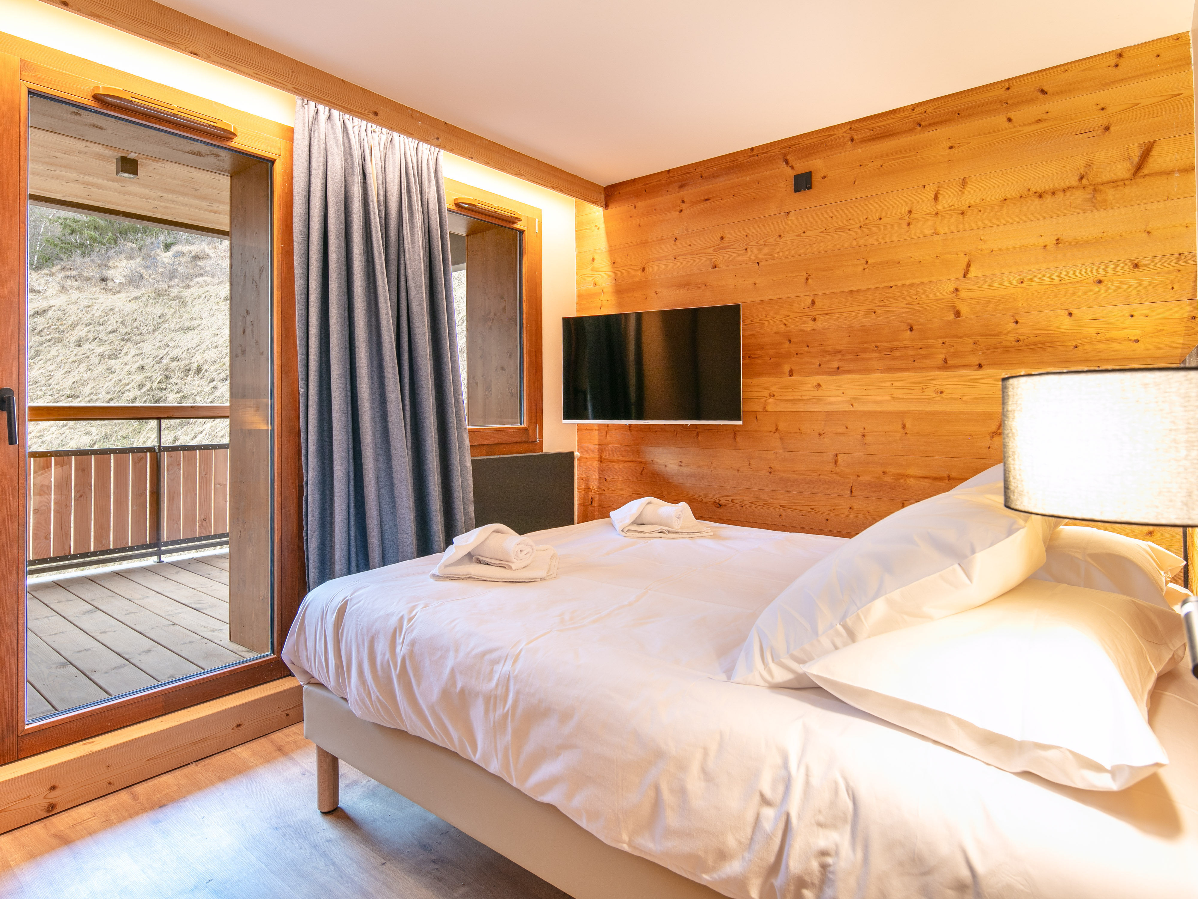 image Relax in a cozy bedroom featuring a double bed, soft linens, and easy access to your private balcony.