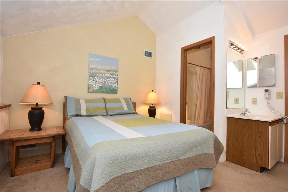 image Peaceful master retreat offering soft light and simple elegance, the perfect place to unwind and rest easy.