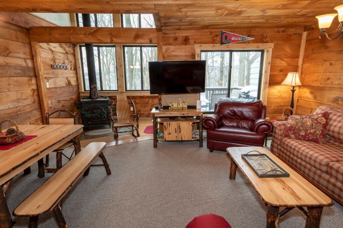 image Inviting living room designed for shared moments, laughter, and relaxation after a day on the mountain.