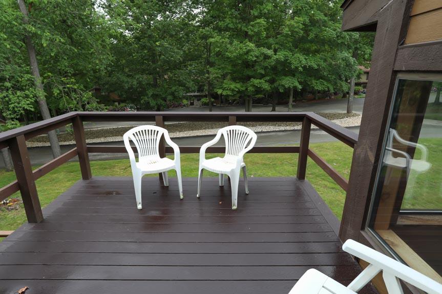 image Expansive deck surrounded by trees—perfect for morning coffee or quiet evenings with friends.