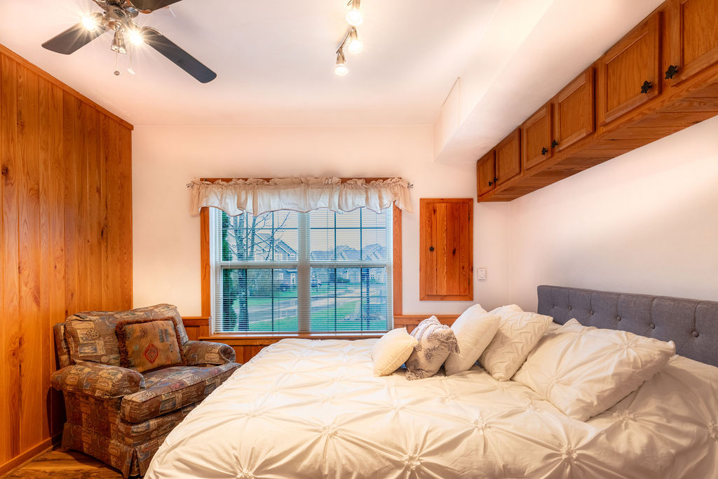 image Gentle mountain charm meets restful comfort in this serene bedroom retreat, perfect for unwinding after a day on the slopes.