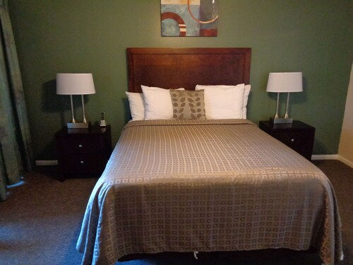 image Peaceful bedroom designed for deep rest, with gentle lighting and soft textures that soothe the senses.