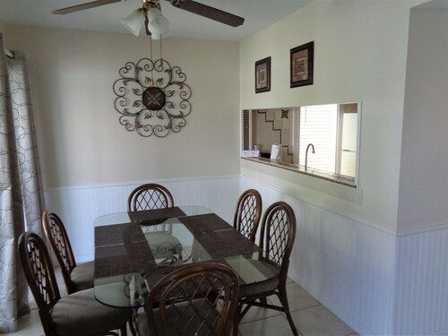 image Cozy dining space made for slow breakfasts, shared meals, and the easy rhythm of island living.