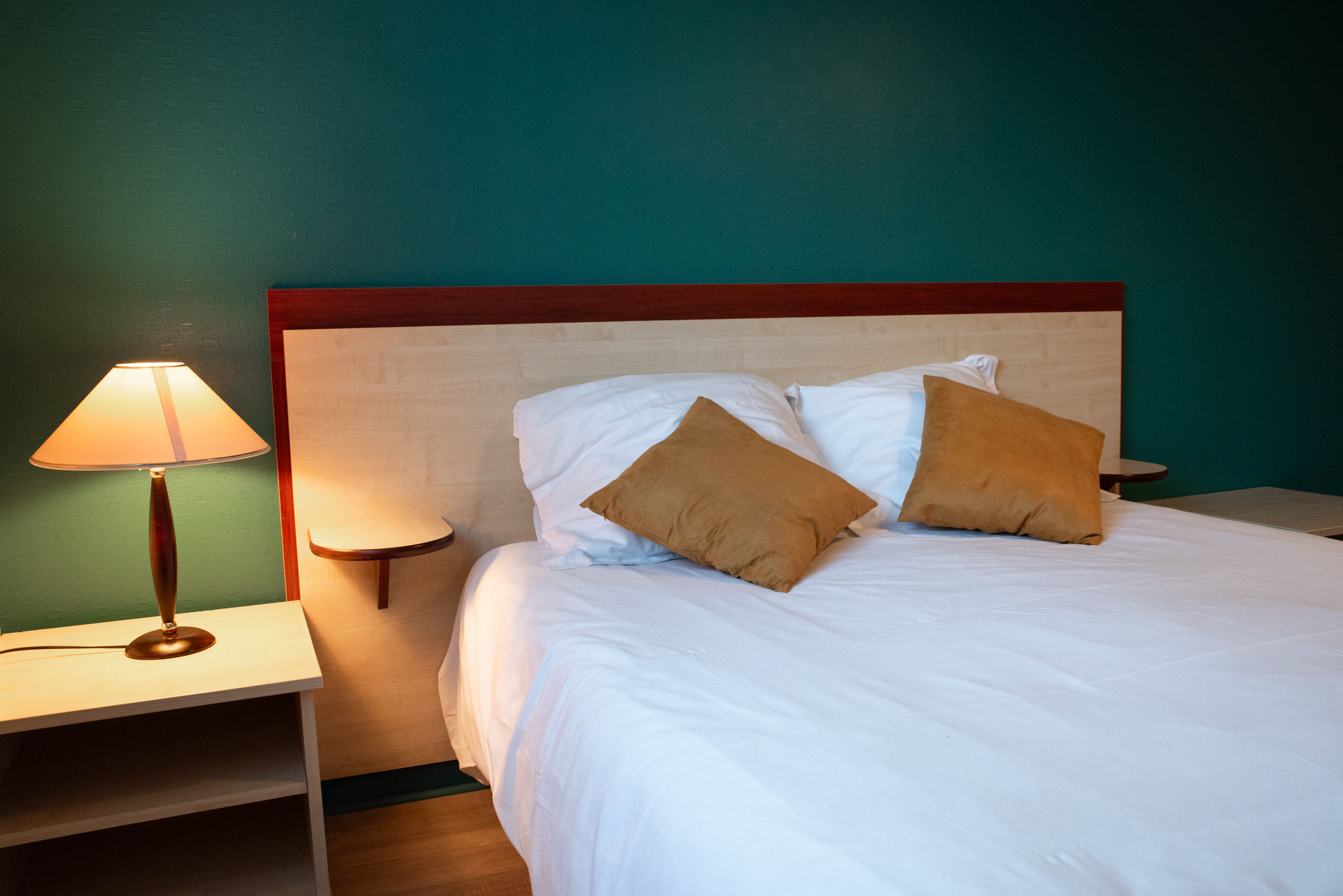 image A calm bedroom designed for restful nights after a full day out.