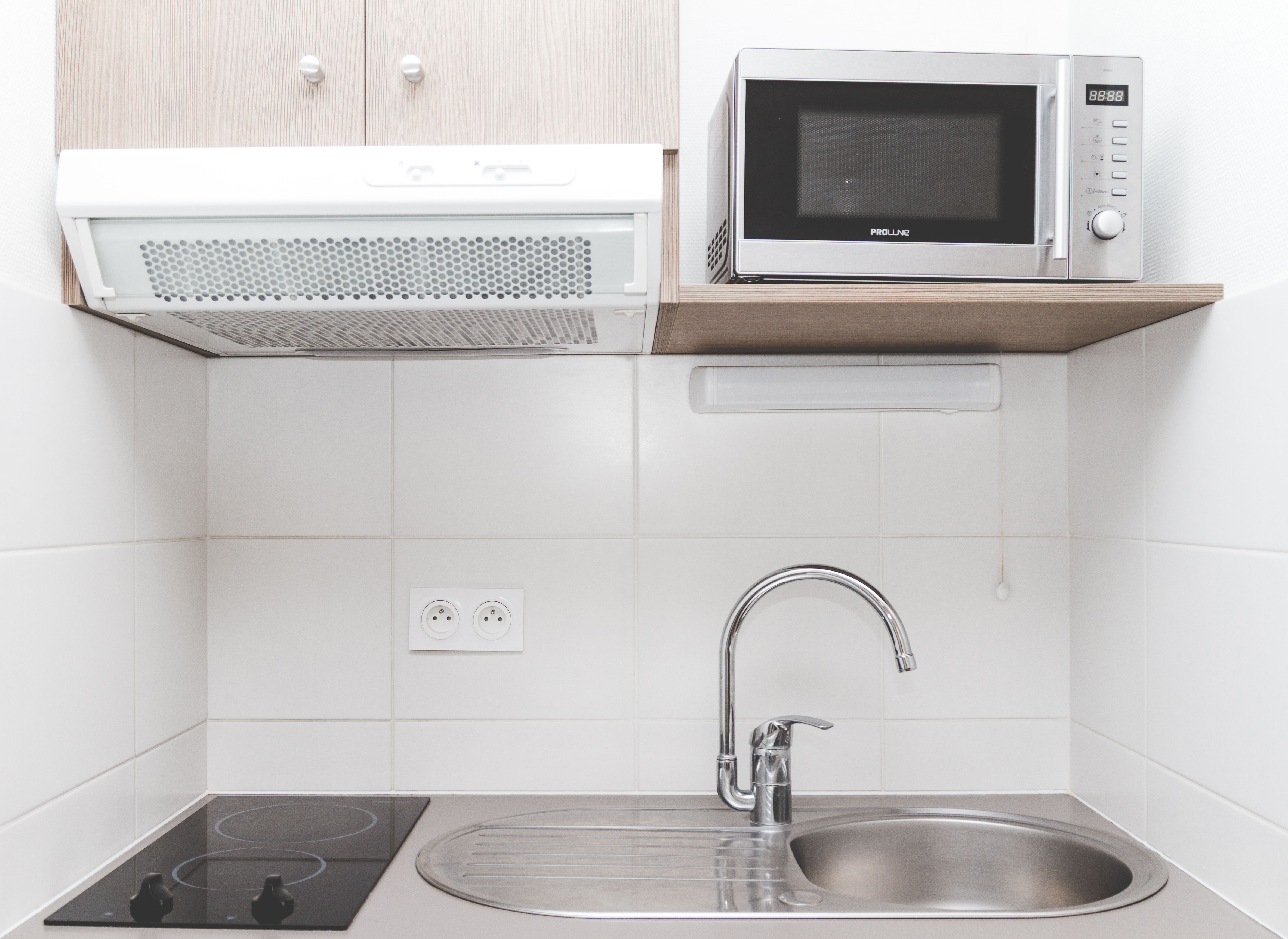 image The kitchenette is fully equipped with modern appliances for easy breakfasts and simple home-cooked meals.