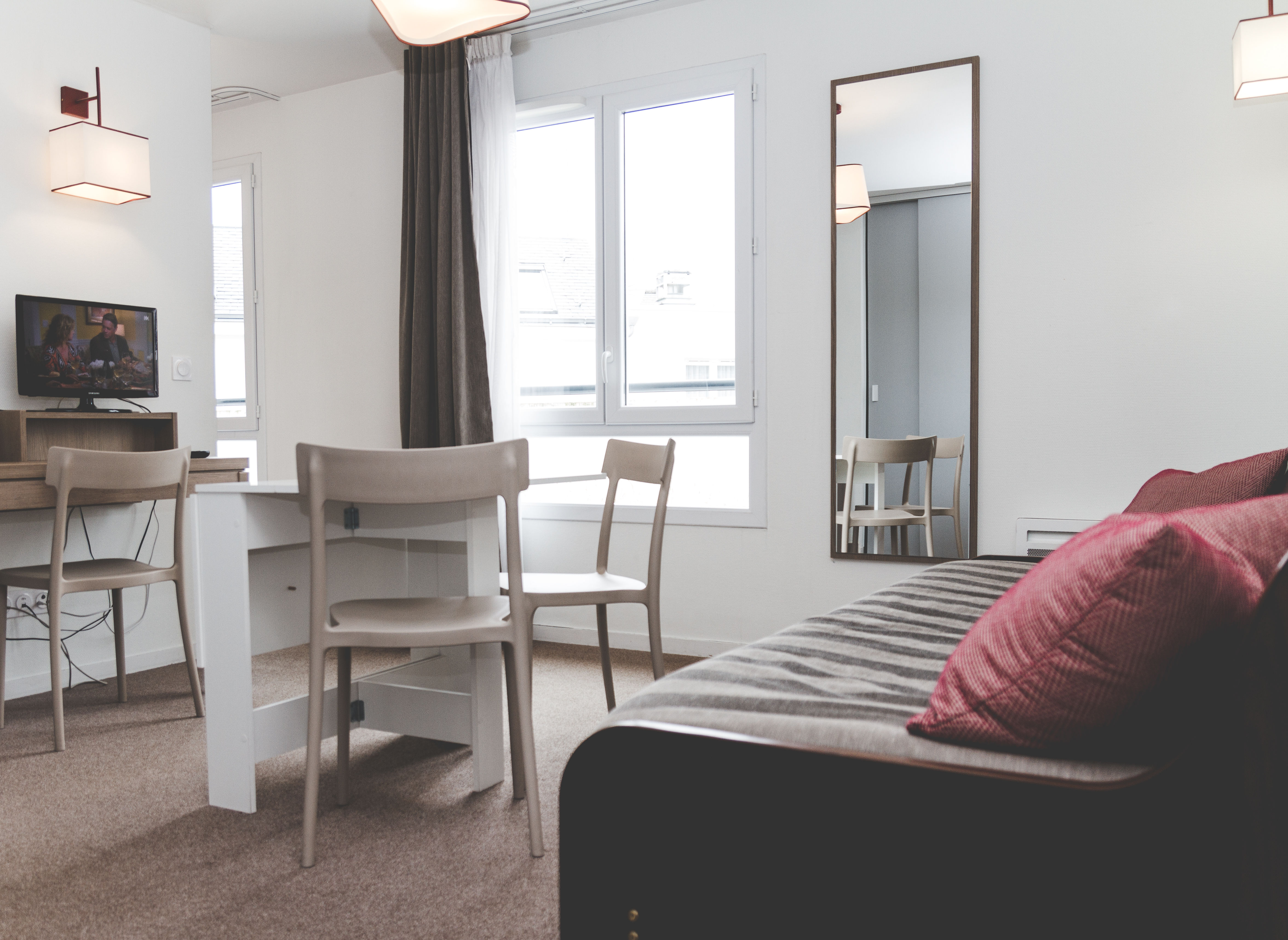 image A warm, thoughtfully arranged living space invites slow breakfasts and relaxed evenings after exploring town.