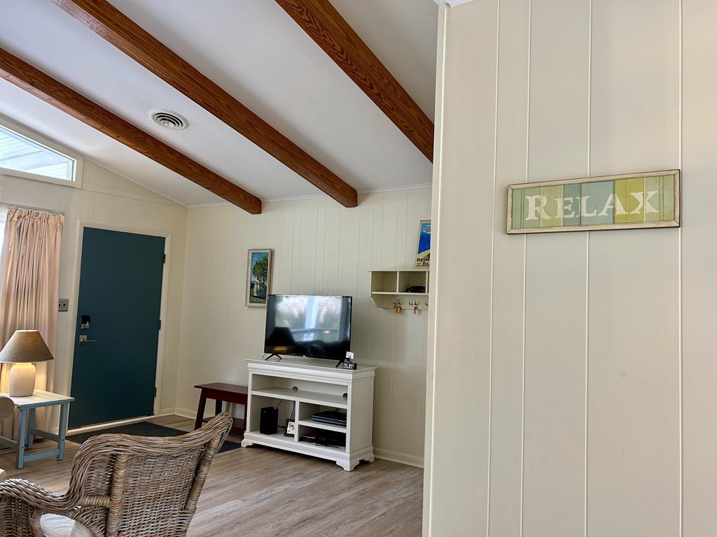 image Step into a cozy living space with warm natural light and inviting furnishings, perfect for unwinding.