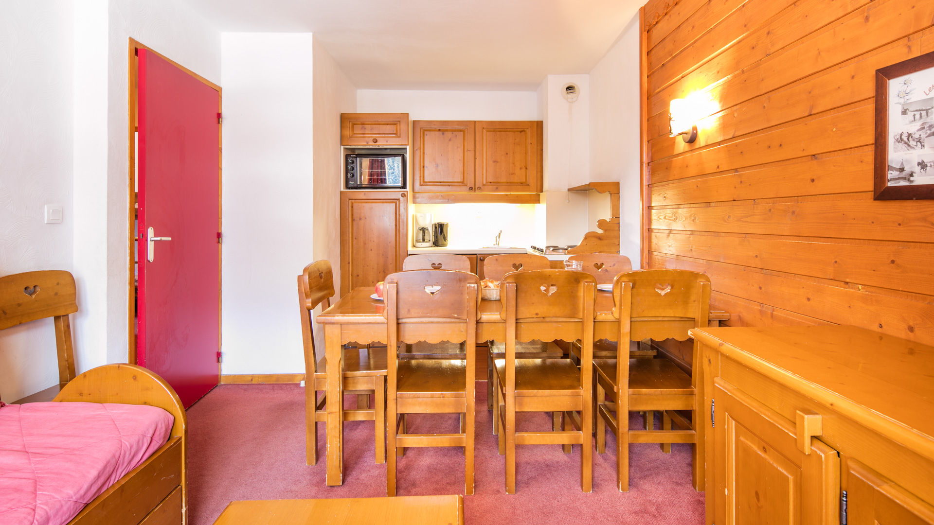 image Fully equipped kitchenette with microwave, dishwasher, and everything you need for easy home-cooked meals.