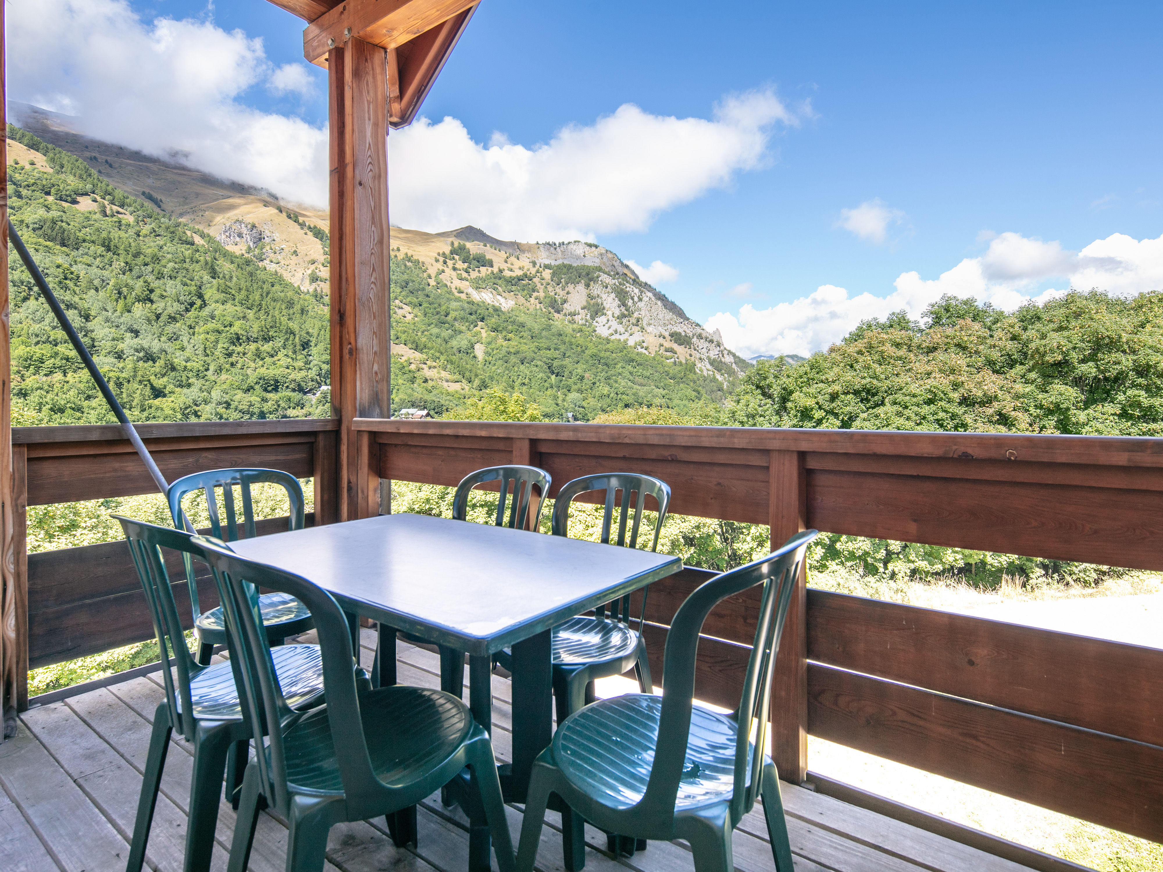 image Private balcony with outdoor dining and stunning views over the Valloire valley.