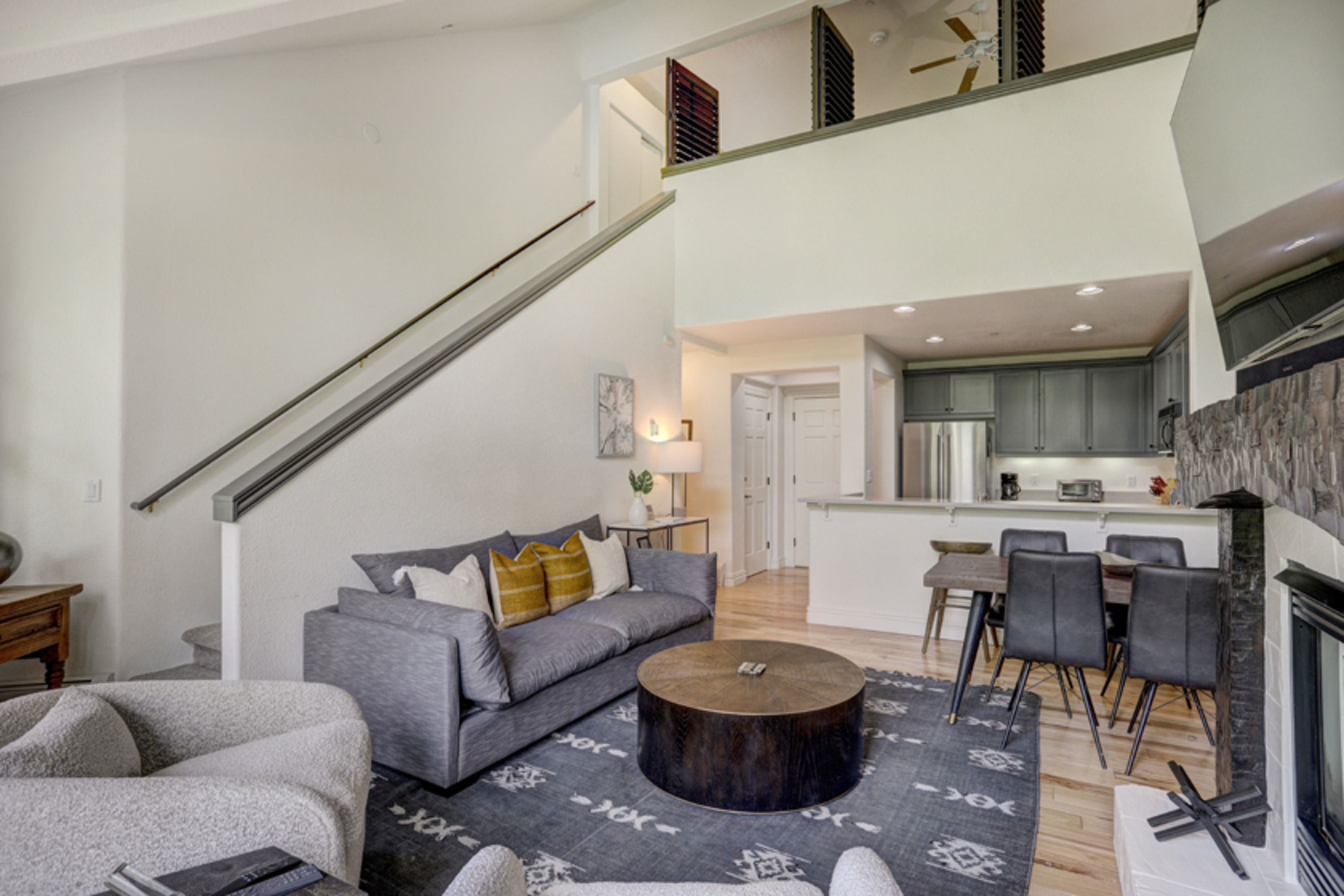 image Spacious and stylish, the open living area blends comfort and character for effortless après-ski relaxation.