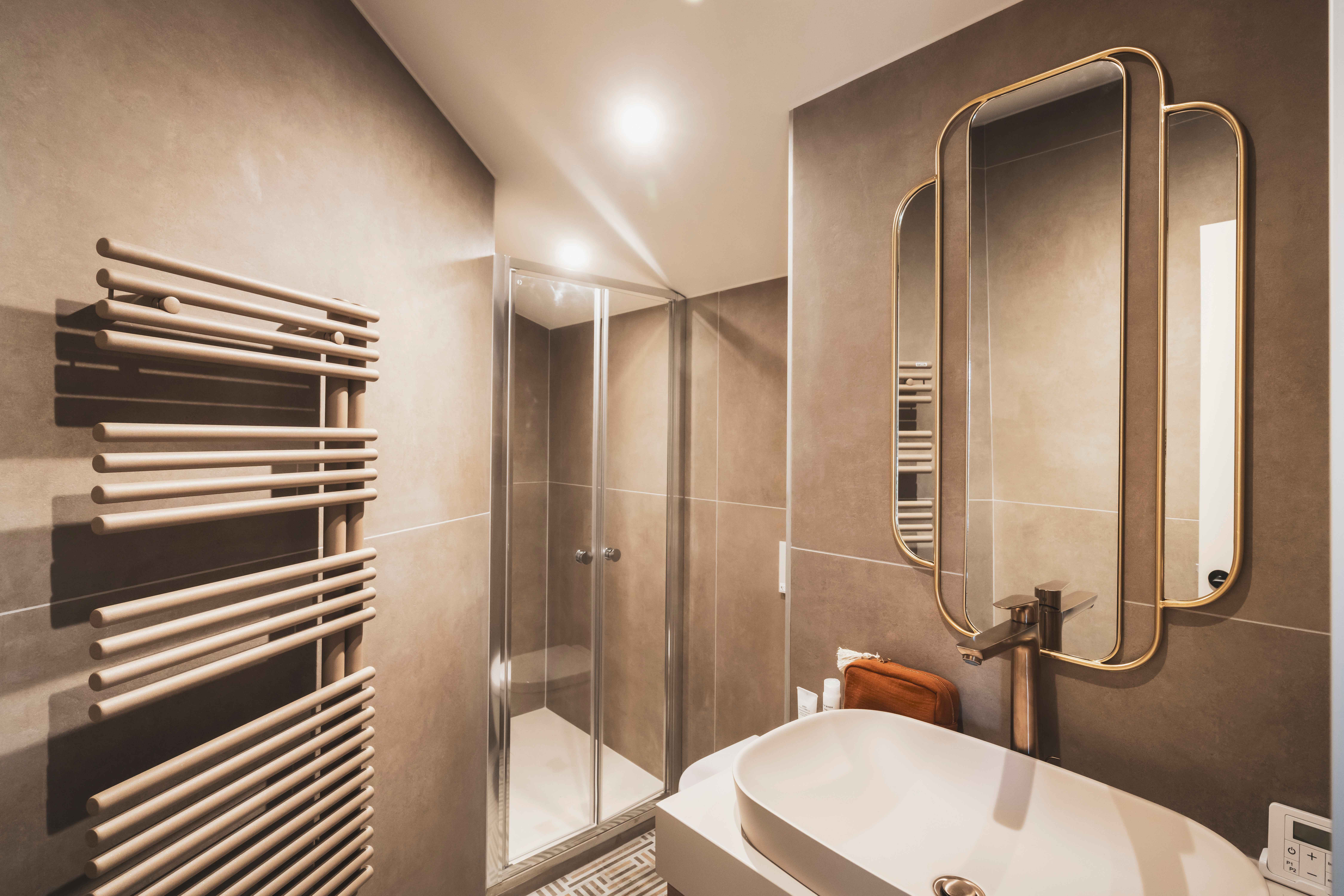 image An elegant bathroom retreat designed for calm and comfort, where minimalist design meets timeless sophistication.