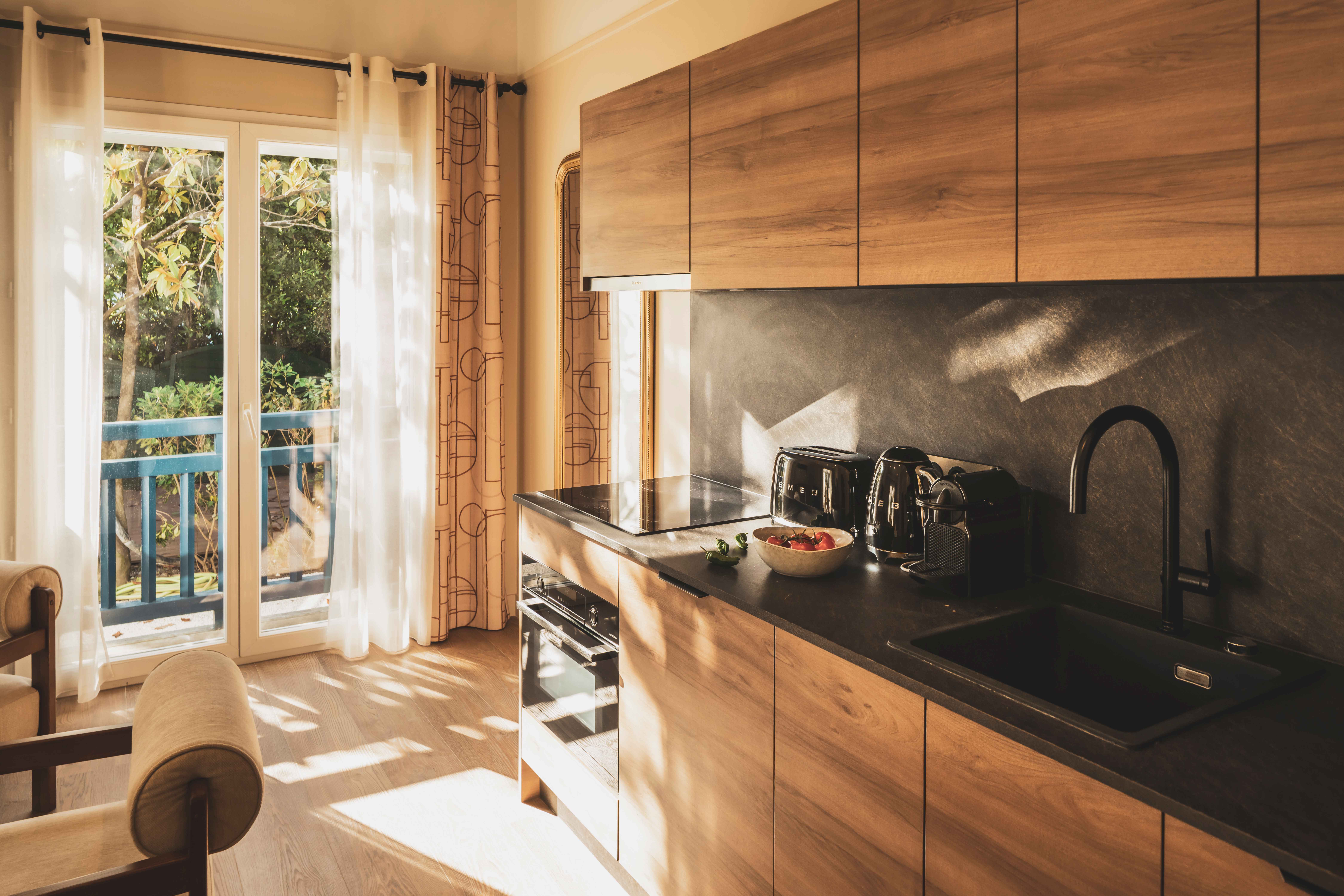 image A sleek, contemporary kitchen designed for easy living—ideal for preparing local produce from the Saint-Jean market.