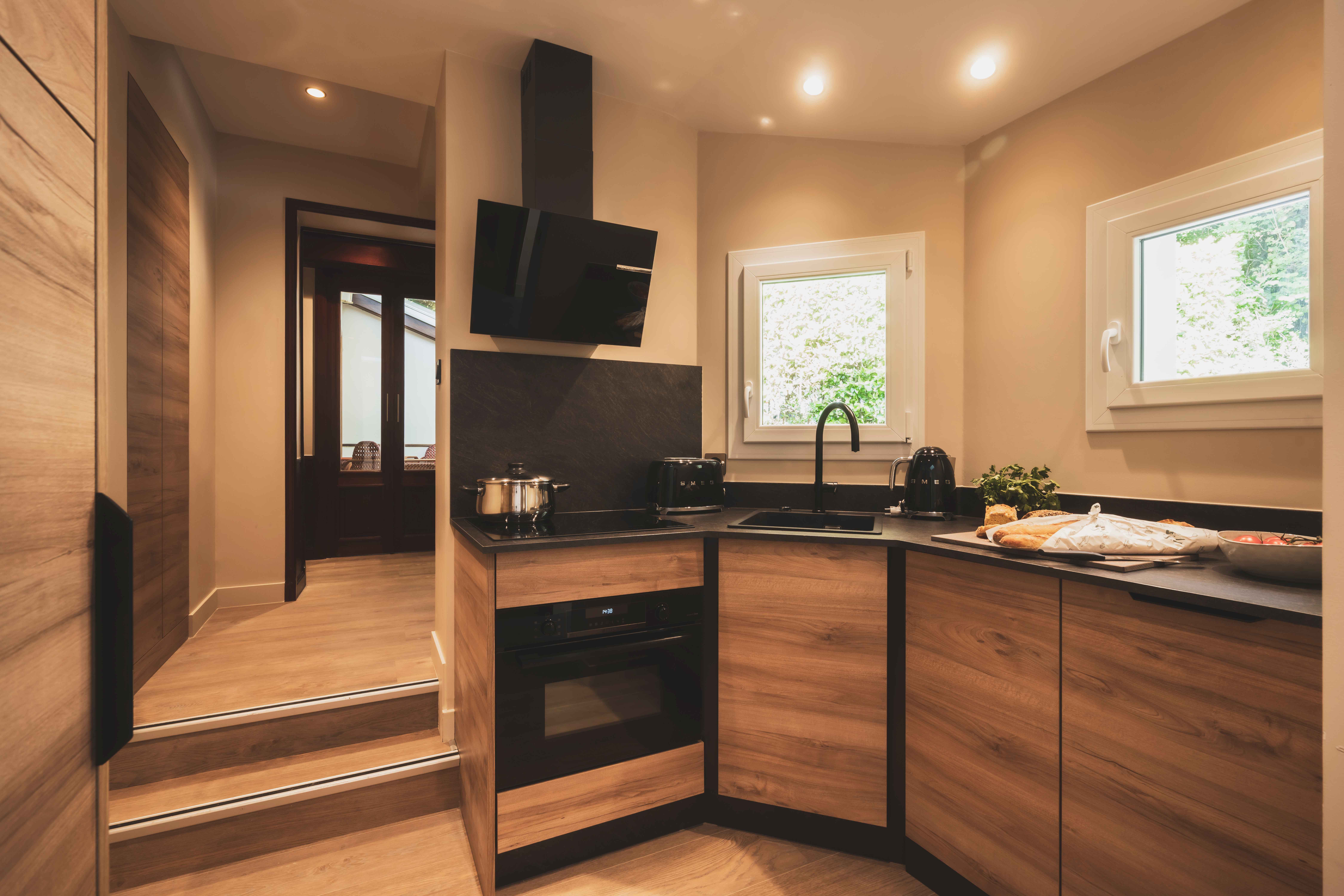 image A stylish open kitchen designed for easy living, ideal for sharing meals made with fresh local ingredients.