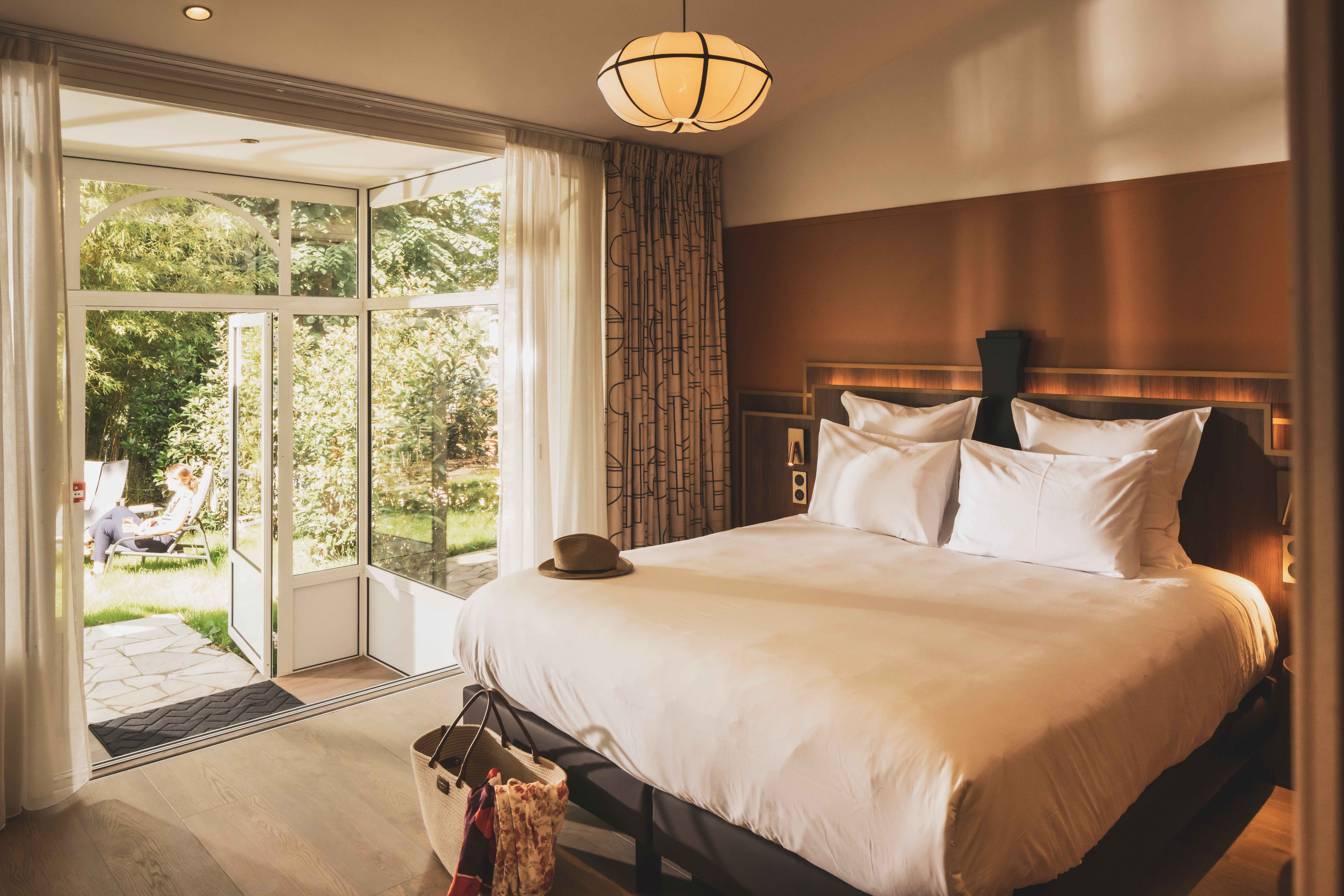 image Wake up to peaceful garden views in a spacious room designed for calm and comfort.